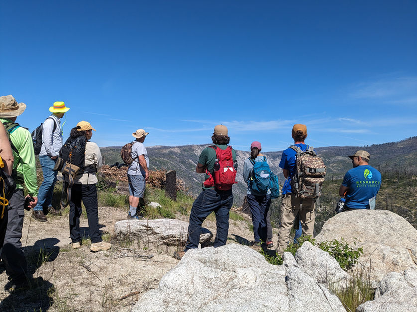 Hikers stop at a viewpoint on the Feather Falls loop trail