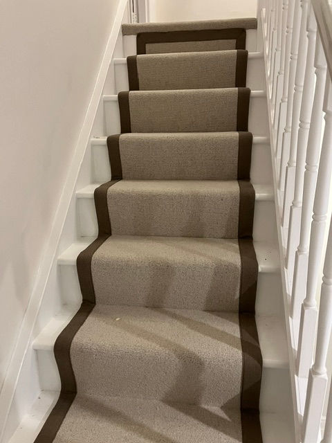 High end wool velvet floor covering with edged banding