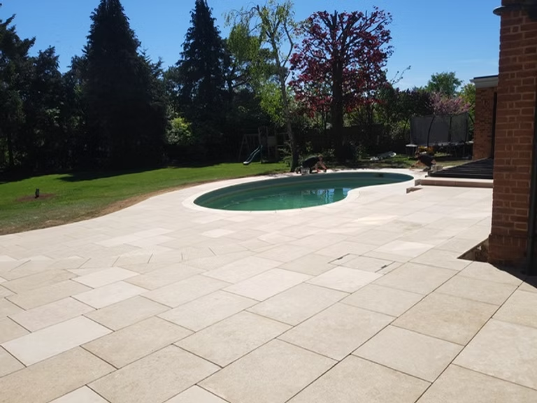 Multi level 100m2 patio area with raised Millboard Decking landing area