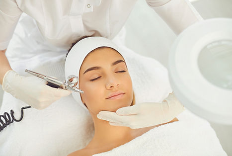 Oxygen therapy skincare in cosmetology. Young womans face getting professional procedure o
