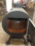 Half barrel stove with firebrick