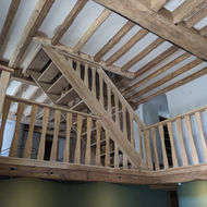 Large house with lots of wood beams after cleaning