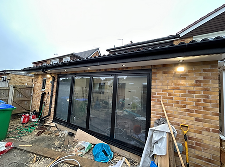 Newly wired outdoor soffit spotlights to brighten up patios and entrances.