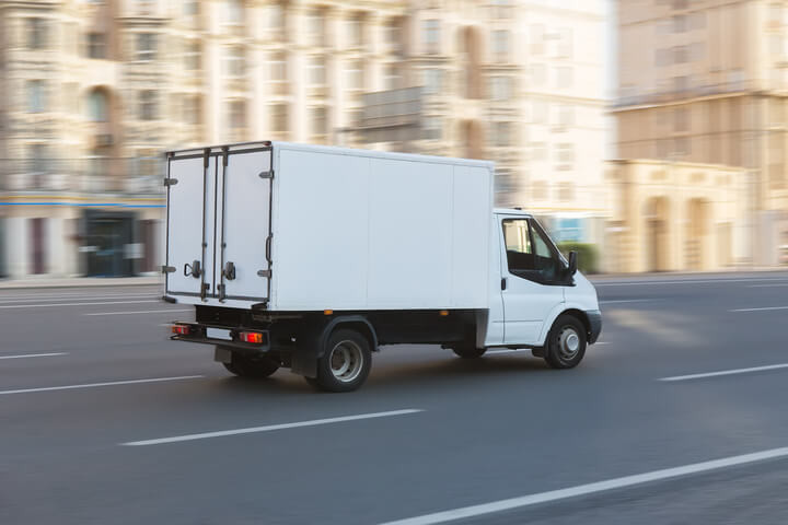 Truck Driving On Street