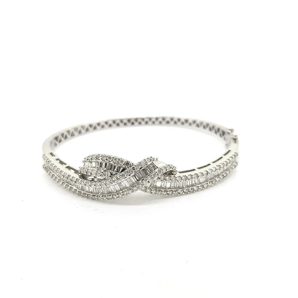 Thumbnail: Diamond  bangle with a twist 2.70Cts