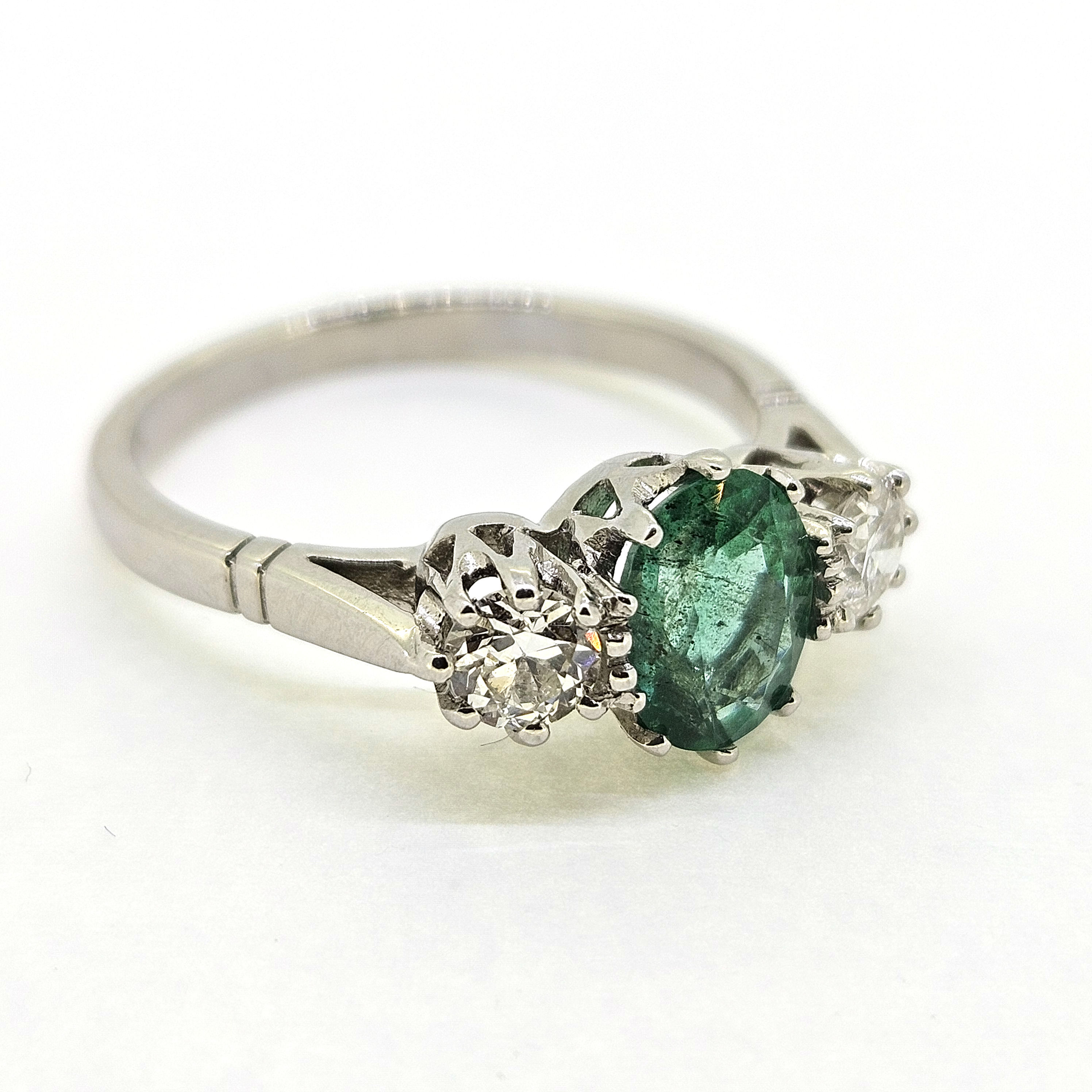 Platinum Oval Emerald and Diamond 3 stone ring E1.20 D0.62