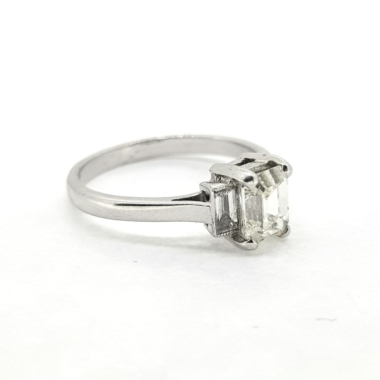 Emerald cut diamond ring D1.03Cts 0.24Cts