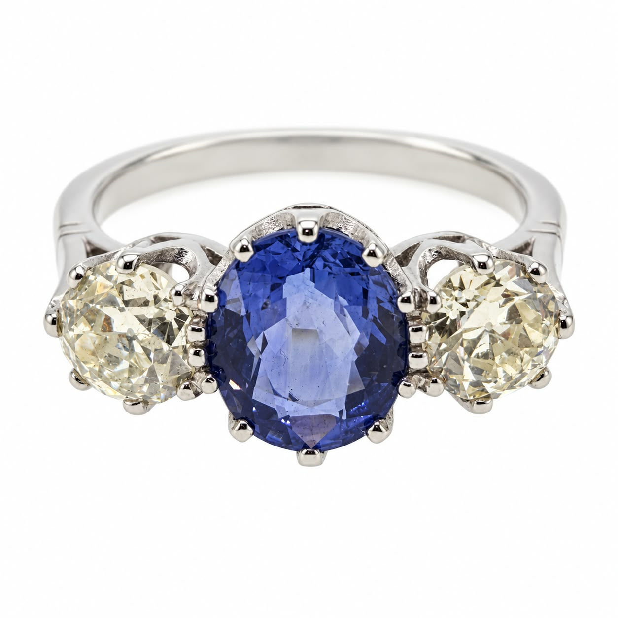 Oval Sapphire & Diamond 3 stone ring. Platinum S2.50cts D1.50cts
