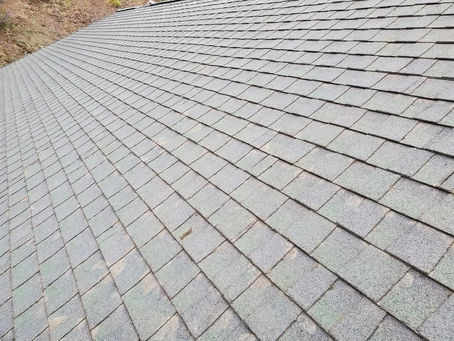 Close view of asphalt shingles on a residential roof