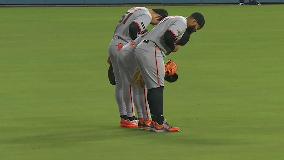 (Giants Outfielders Lee, Gilbert, and Ramos Bow To The Crowd)