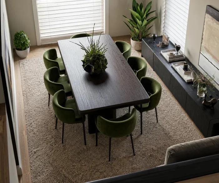 Render con IA del comedor conectado visualmente con la cocina, que mantiene los mismos tonos oscuros y el lenguaje de materiales para un espacio coherente, creado con ArchiVinci.