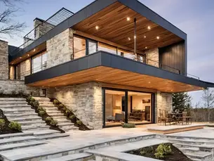 A modern multi-level home with stone and wood finishes, captured through ai architectural rendering to highlight sleek geometry, warm lighting, and harmonious integration with the surrounding landscape.