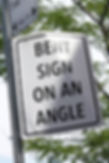 street art bent sign on an angle