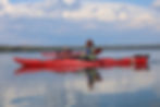 Calm day of paddling on the Lewis Lake afternoon kayak tour.