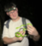 Joery and a wild green vine snake in Malaysia