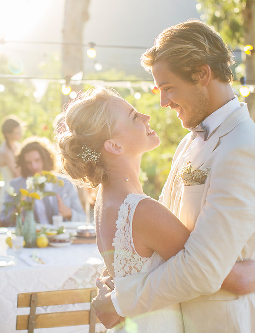 Outdoor wedding reception couple