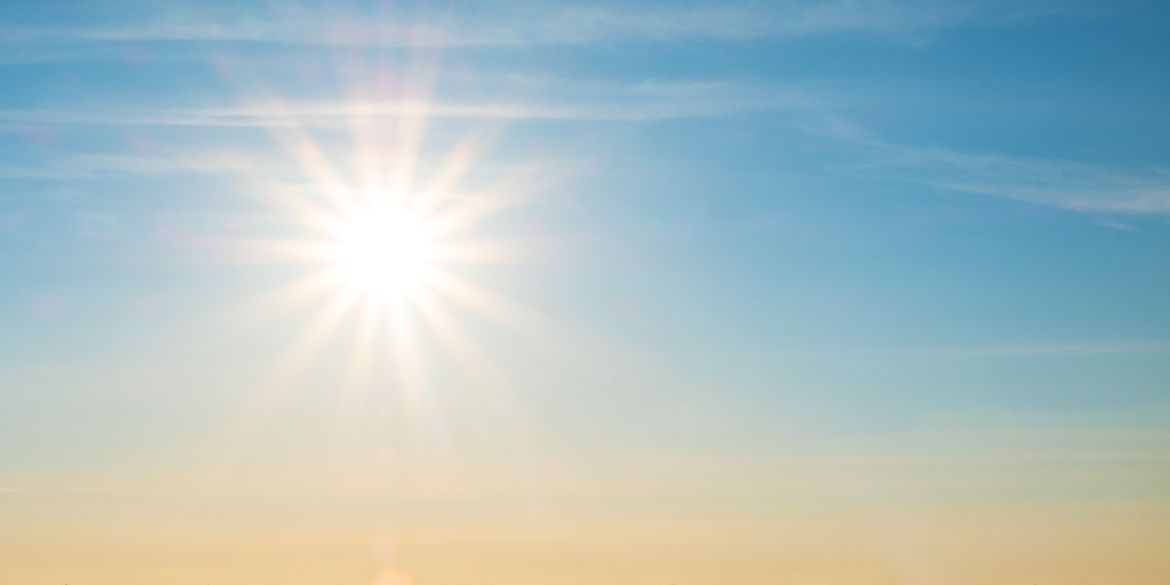 beautiful setting sun and blue sky with copy space.jpg