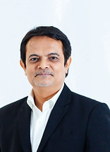 Datuk Naseer - CEO ECOS pic standing up_edited.jpg