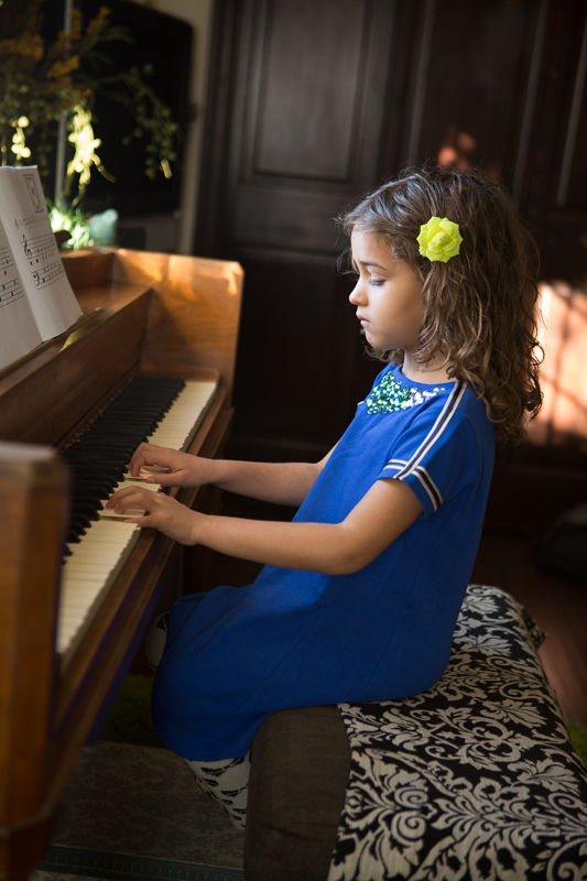 A girl playing the piano