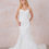 Thumbnail: A Enzoani Kendall Ivory designer mermaid  trumpet silhouette wedding gown featuring lace appliques in a 3d style. At BWTR