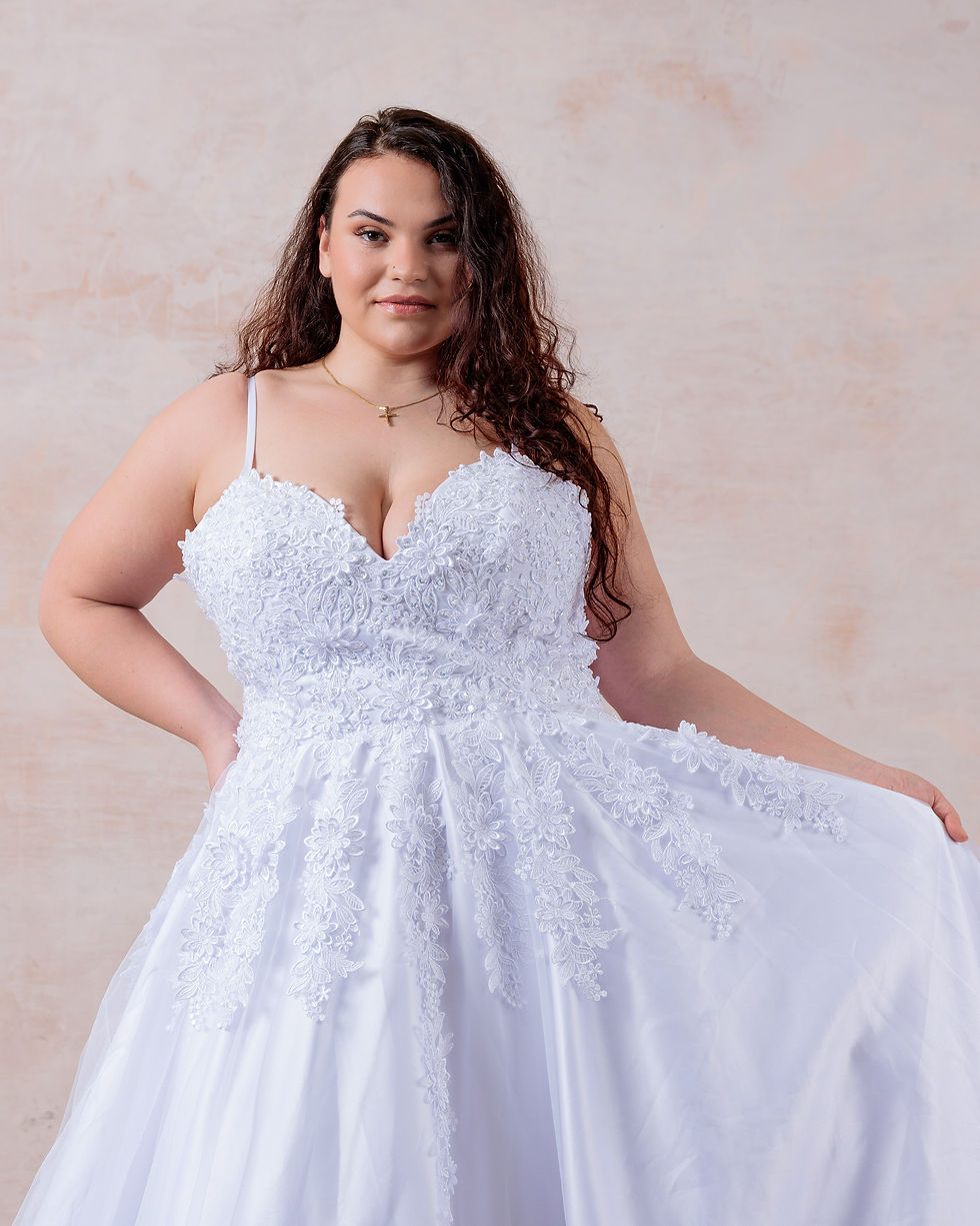 Thumbnail: Juliet is a stunning spaghetti strap princess wedding gown with 3D lace appliques, a flattering V neckline, and a secure back