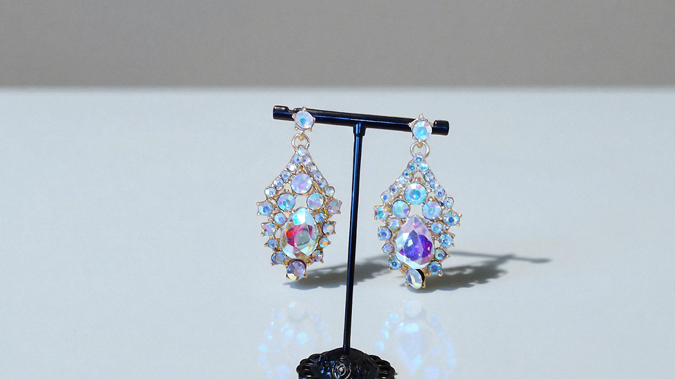 Discover elegance with The Arria Earrings, vibrant rhinestone pieces perfect for a formal night.