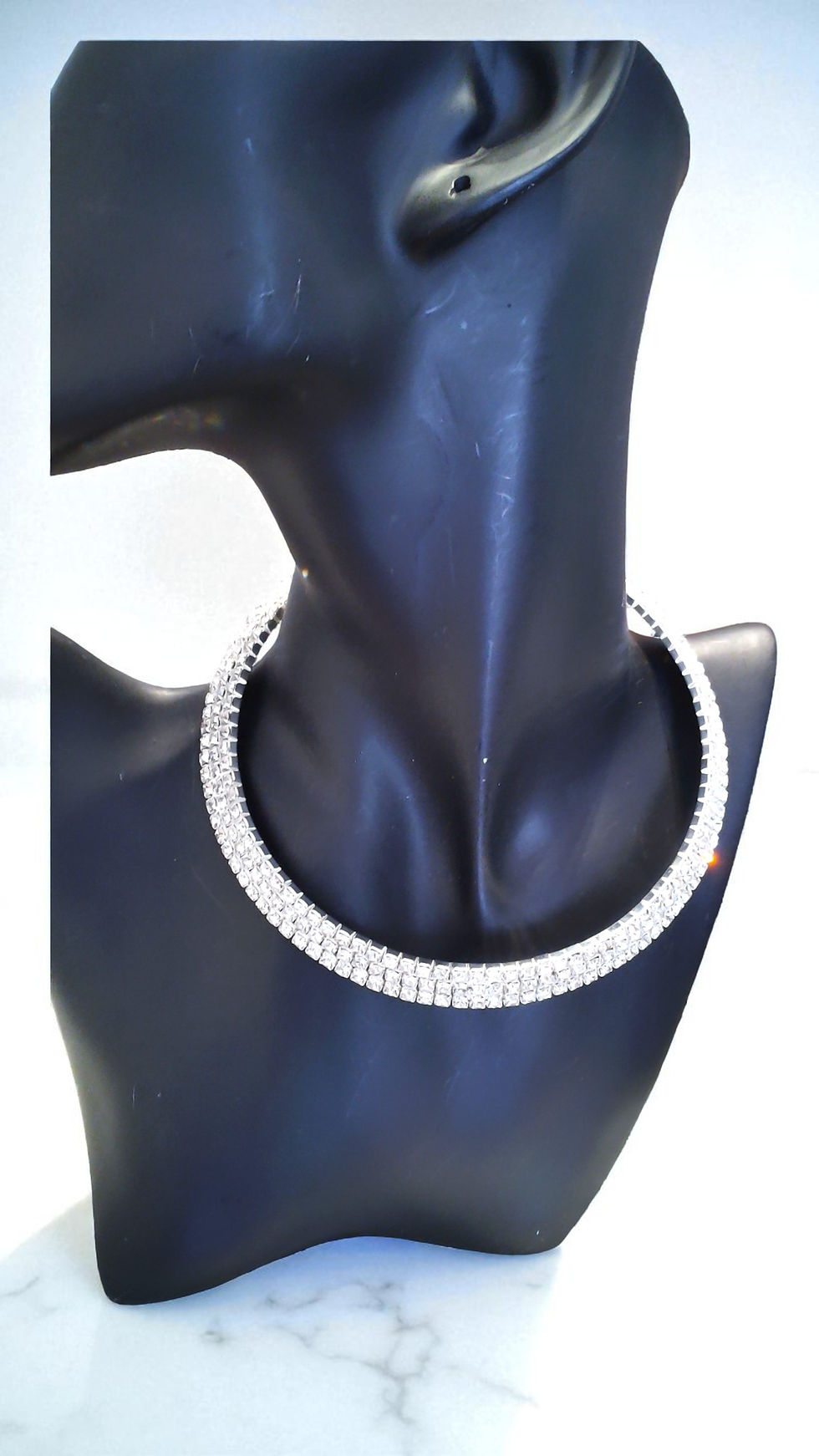 Thumbnail: The Cara Choker by With Love adds sparkle and elegance, perfect for any occasion. This rhinestone choker with a link chain cl