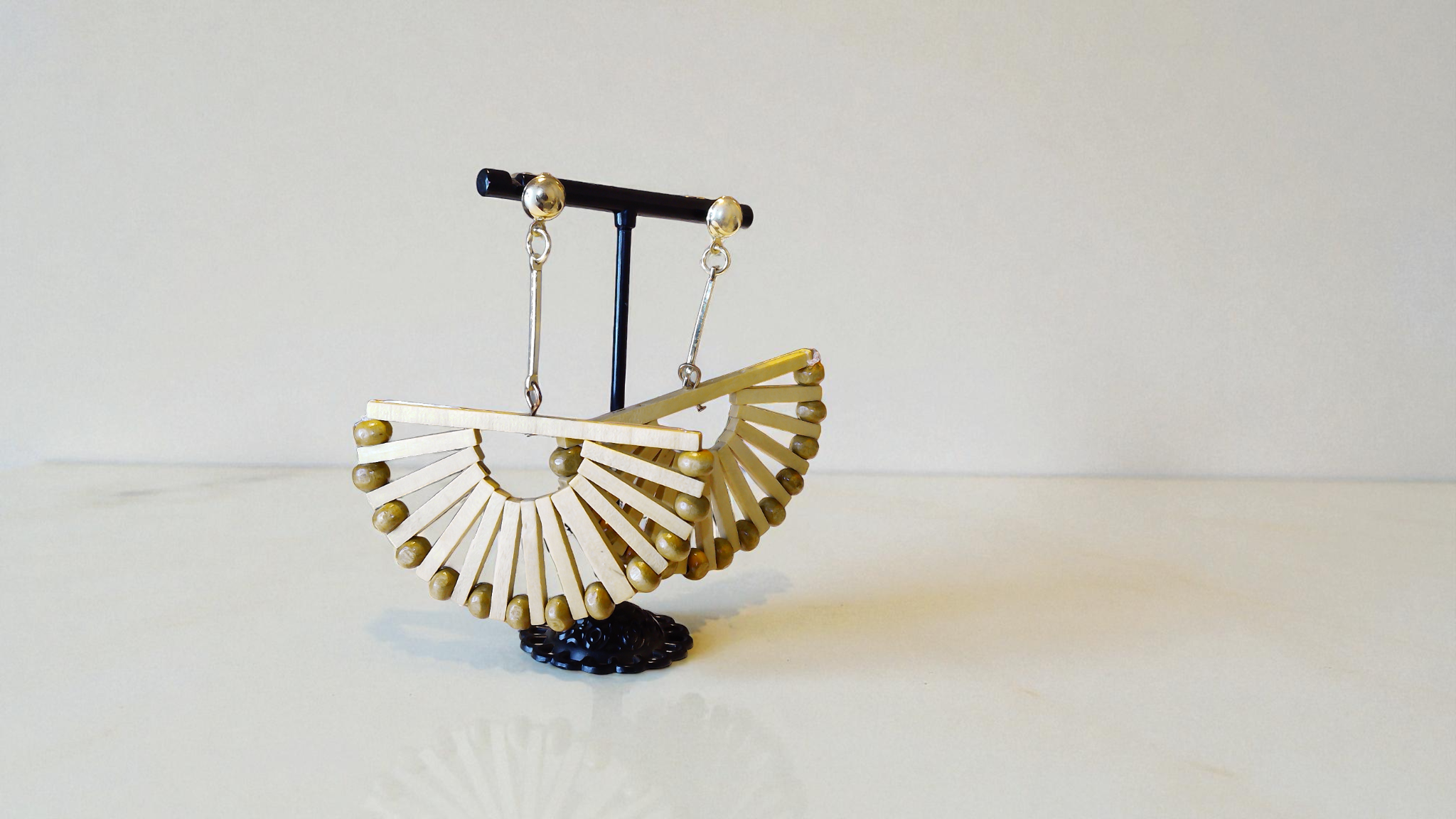 Discover The Bianca Bamboo Earrings at With Love, The Gift Shop. These unique bamboo earrings, featuring a gold tone bar and