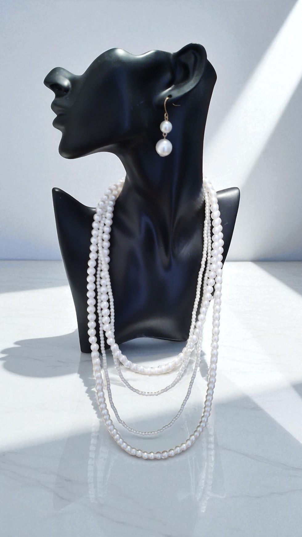 Multi-strand pearl necklace set with matching earrings
