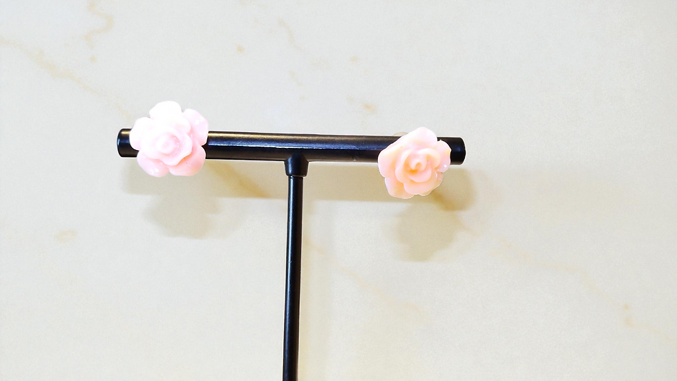 Delight the little one with The Children's Flower Earring, a cute pink flower accessory.