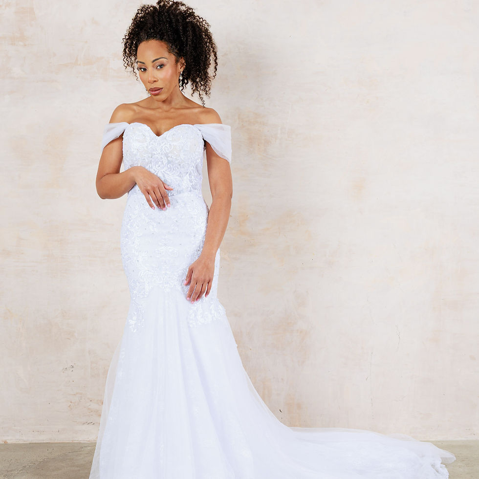 Discover Ana, a Joan of London wedding dress at BWTR, your South East London bridal boutique. An off-the shoulder mermaid.