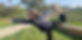 Woman doing yoga at the park on a sunny weather.