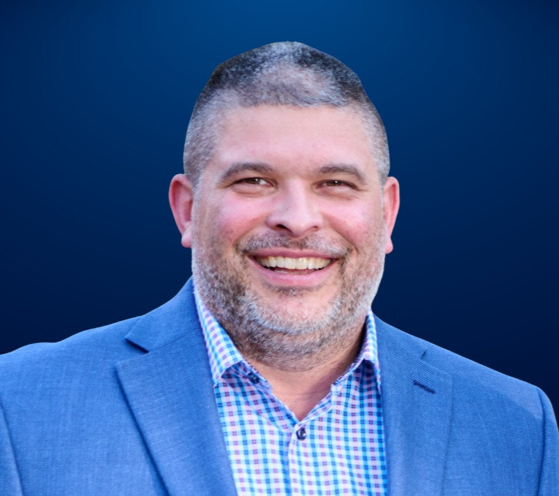 Jason Miller speaking at a press conference