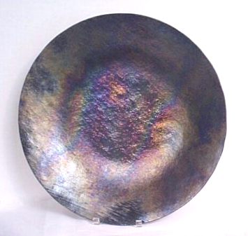 Large black lava looking bowl with black iridescent textured glass