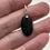 Thumbnail: Beach Stone Pendant -Smooth black oval 