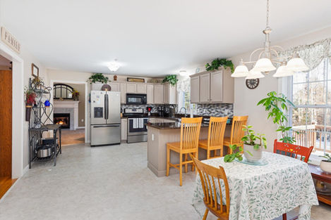 Spacious kitchen, island, dining area, fireplace, homes for sale NH MA.