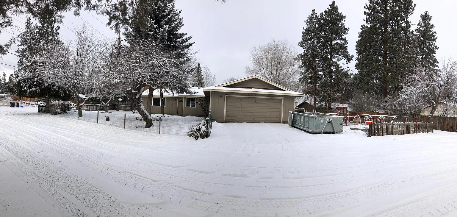 Before photo - front of house in snow