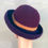 Thumbnail: Purple/Apricot/Plum - Striped Hat