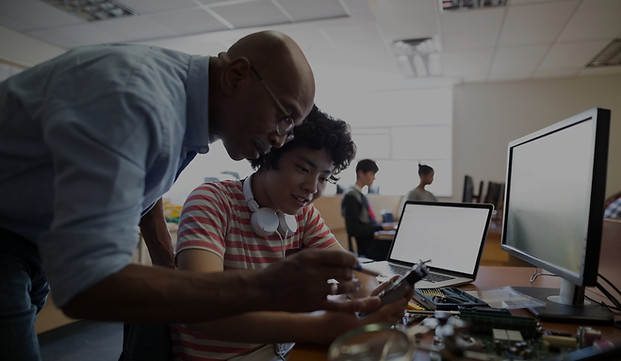 Teacher Assisting a Student_edited.jpg