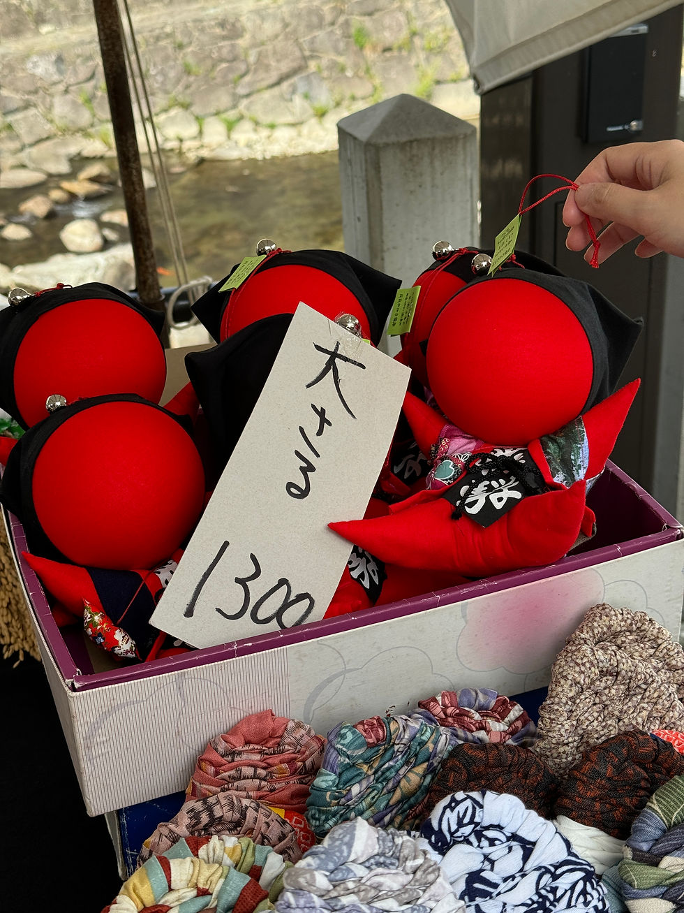 Sarubobo stall along Miyagawa Morning Market