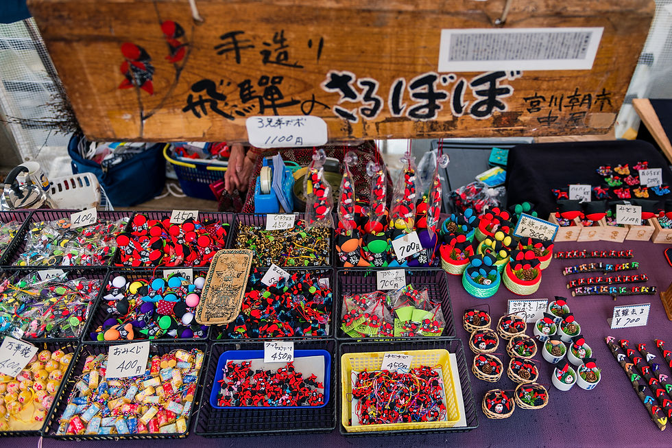 Different colors of Sarubobo dolls