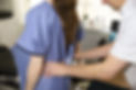 Patient receiving chiropractic treatment