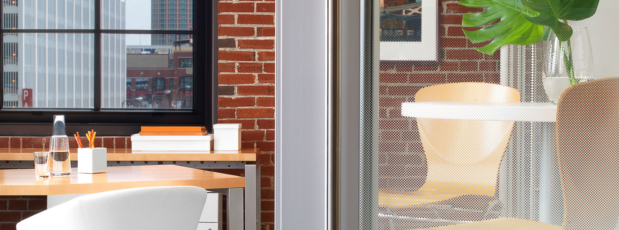 Office seating area with tinted windows