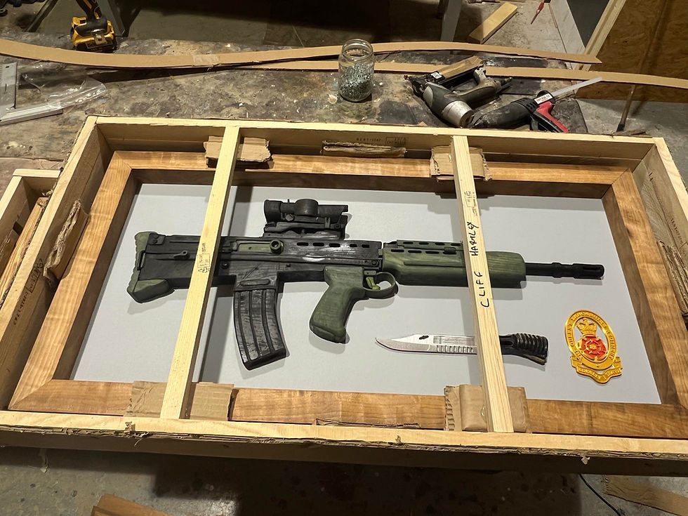 Thumbnail: Veteran crafting SA80 hardwood hand-carved art