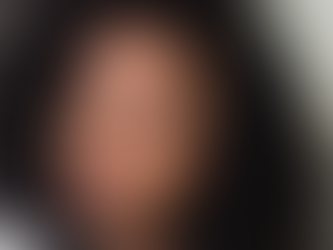 Bree wearing ISEE Hair Kinky Curly Half Wig