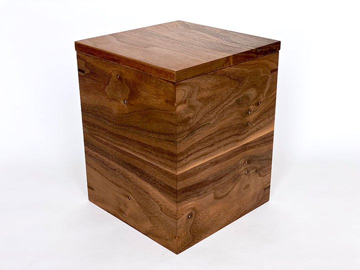 Thumbnail: Minimalist Walnut Cremation Urn With Gold Leaf Detail