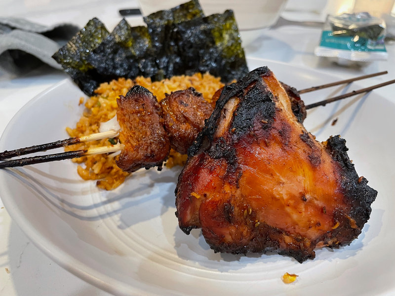 Hoisin charcoal roasted chicken skewers.