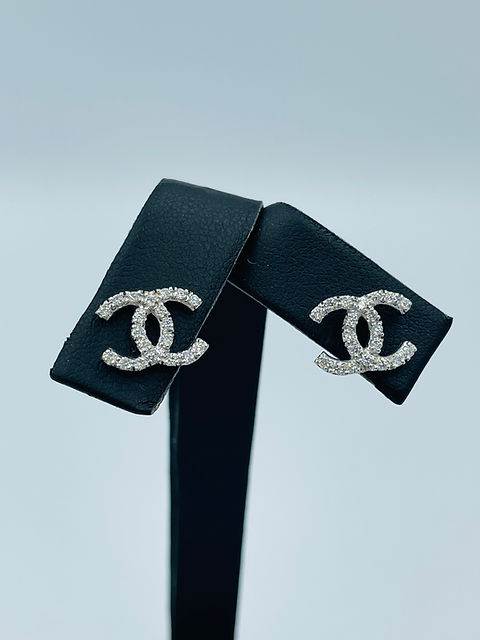 White gold chanel earrings top
