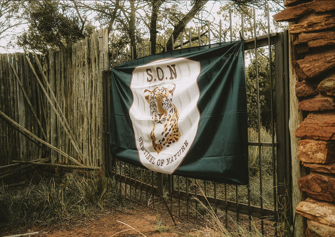 The Sentinel of Nature flag at the reserve gate