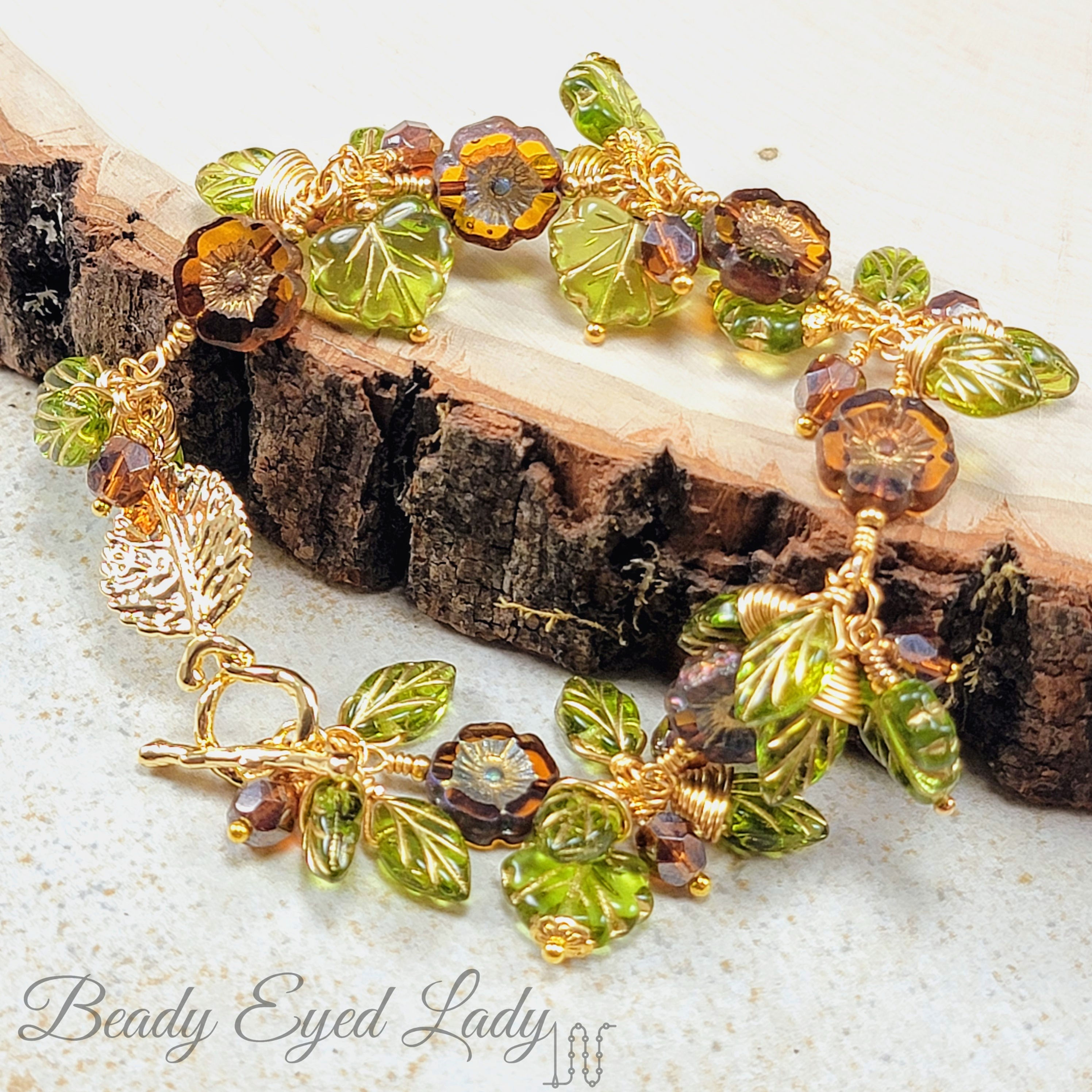 Brown flowers with green leaves cha cha gold bracelet